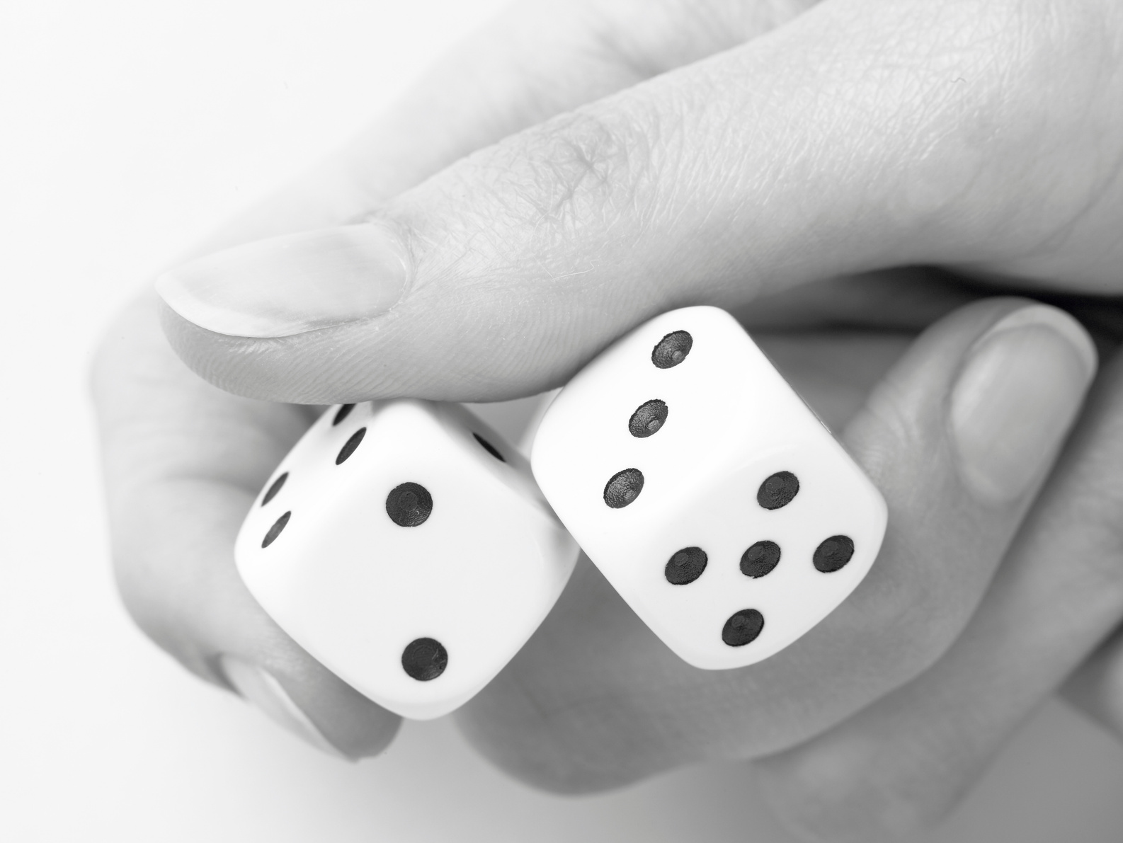 Hand rolling dice